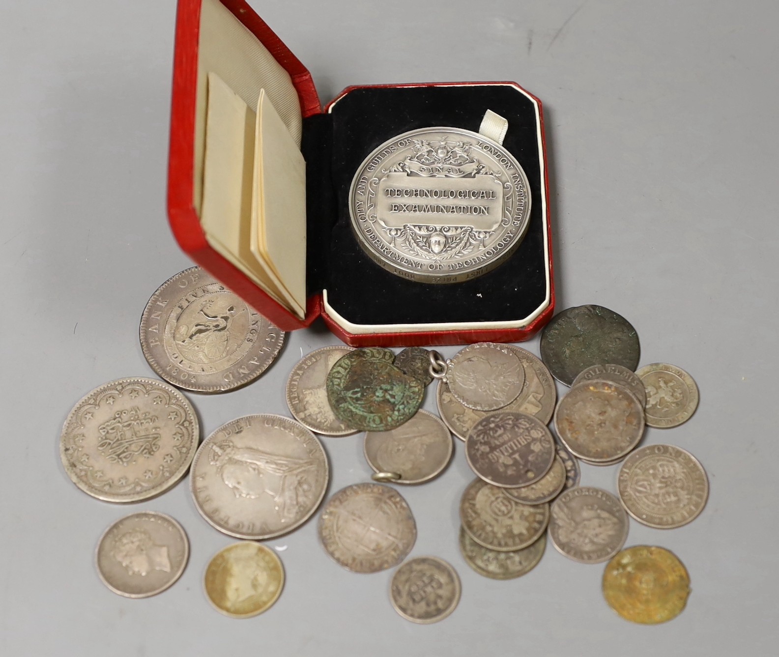 Pre 1947 silver coins and a technological examination medal stamped ‘sterling silver’ the edge stamped ‘ALFRED JOSEPH YORKE MAGNUS, FIRST PRIZE, BOOT AND SHOE MANUFACTURE, 1955’